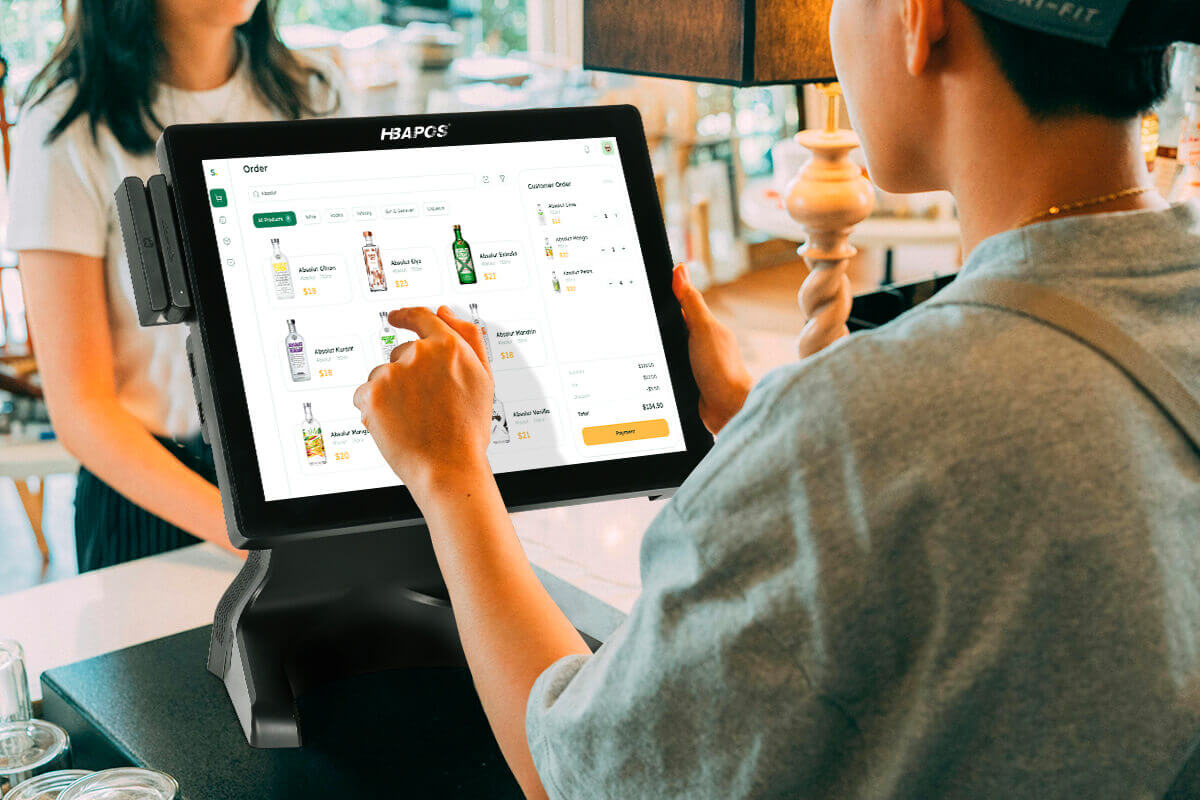 Restaurant cashier is using the HBA-S100 Pos system to collect cash