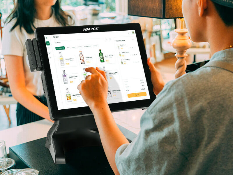 Restaurant cashier is using the HBA-S100 cash register to collect cash